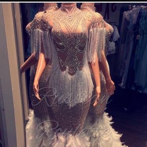 large size dress but can fit a medium, worn once for a couple hours